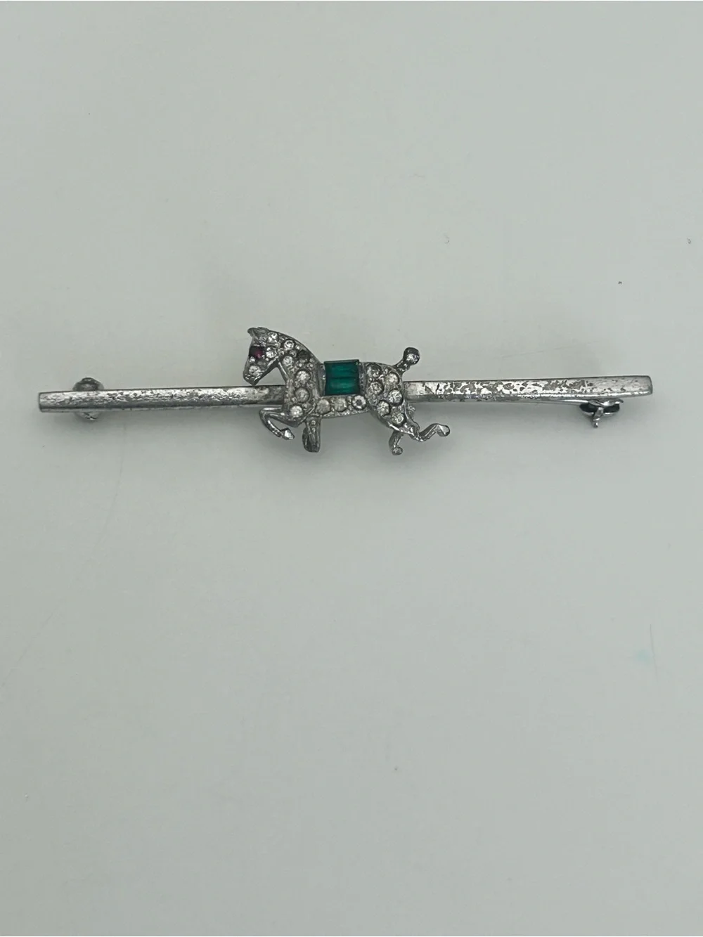 Silver Horse Bar Brooch with Green Center Stone